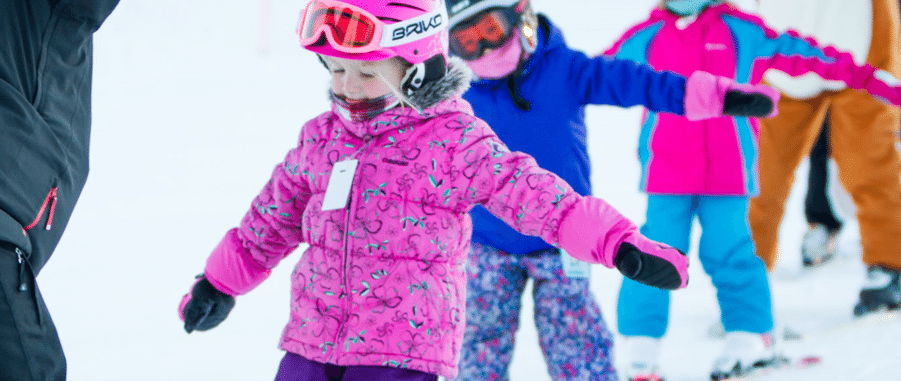 Kids in a ski lesson